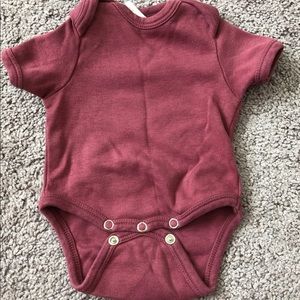 Kate Quinn onesie